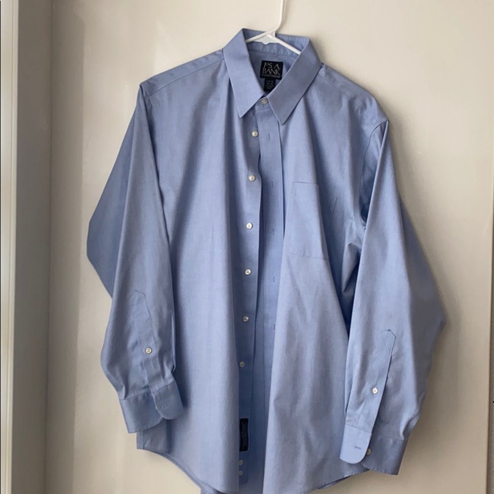 Mean blue dress shirt.